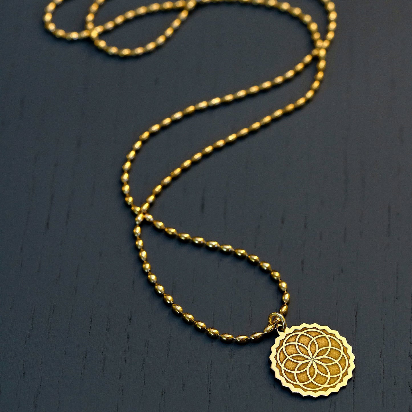 the creator | lucky charm | long brass pendant