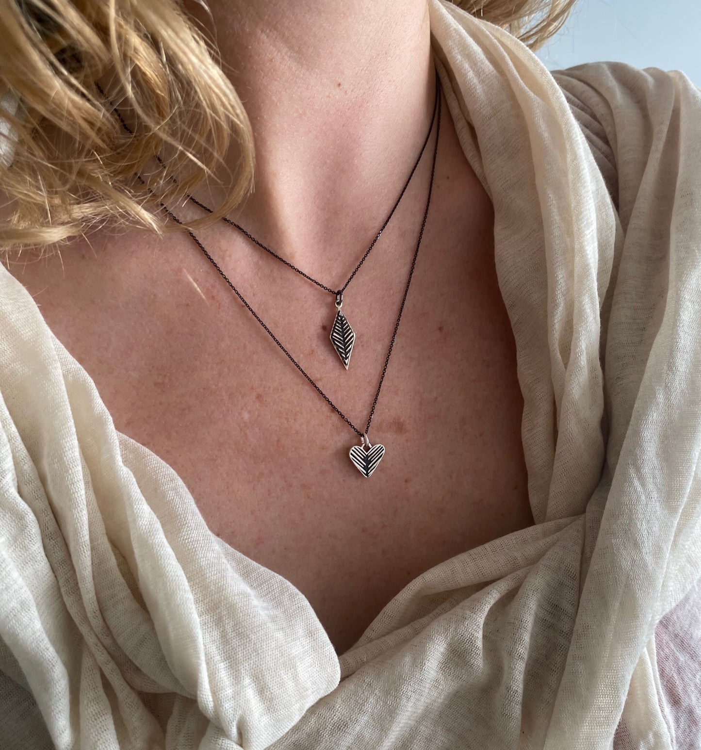 romvos velonies/stitches | small silver pendant